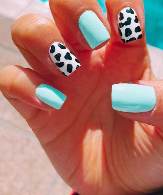 Cow Print and Teal Nails.jpg