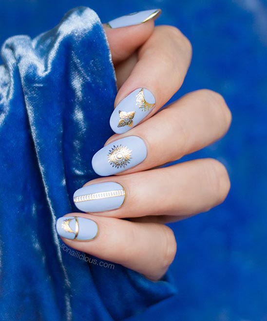 Light Blue White and Gold Nails