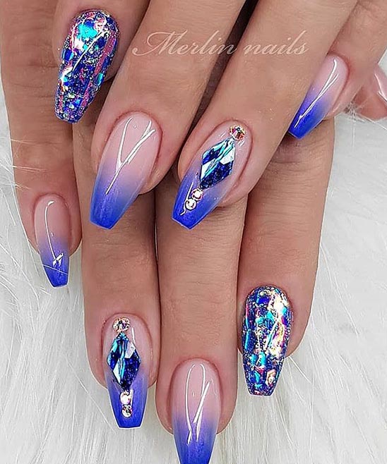 Nail Art With Blue and Golden Colour.jpg