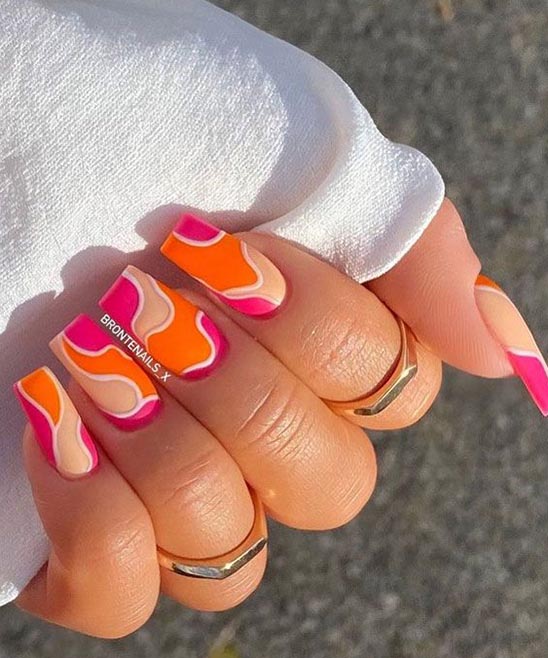 Orange Nails With Design