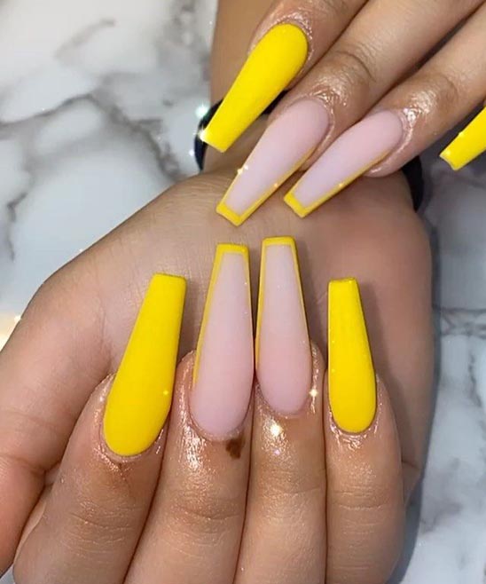 Pastel Yellow Nails With Design
