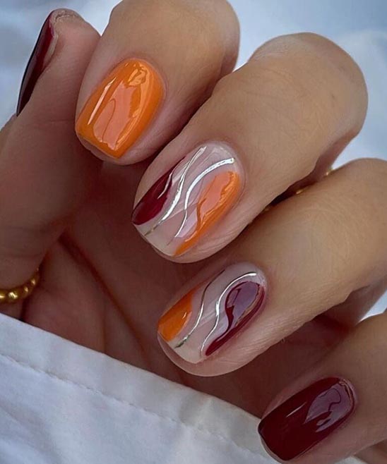 Purple and Orange Nail Designs