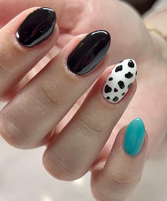 Teal Nails With Cow Print