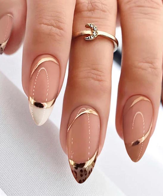 White and Gold Almond Nails