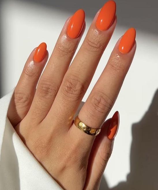 White and Orange Nails