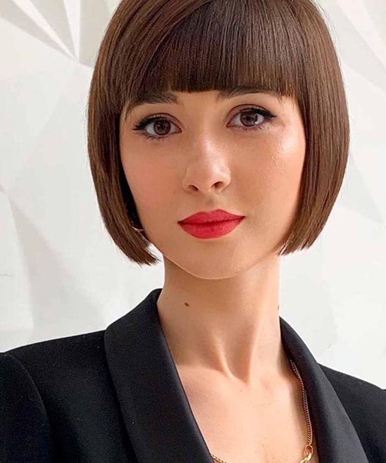Hairstyles Long in Front Short in Back With Bangs