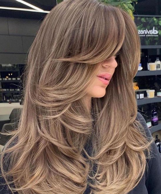 Medium Haircut With Layers and Side Bangs