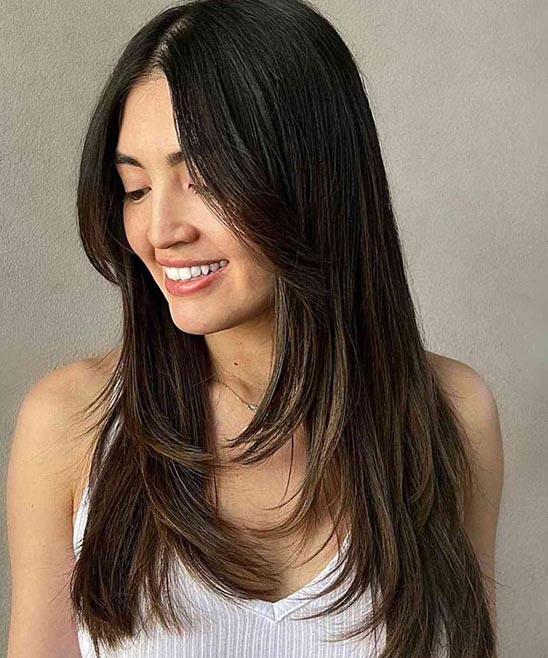 Medium Length Haircut With Layers and Side Bangs